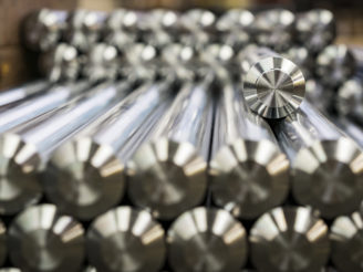 Custom hydraulic cylinders stacked in a pile Custom hydraulic cylinders stacked in a pile