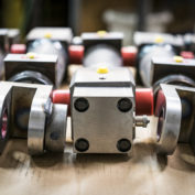 Hydraulic cylinders in a line on a table